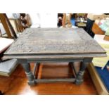 A 19thC. possibly Portuguese, carved low level table