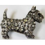 A silver Scottie dog brooch