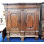 A 17thC. oak Baroque armoire with geometric carved