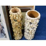 Two sea shell stick stands