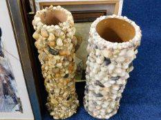 Two sea shell stick stands