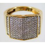 A 14ct gold art deco style ring set with diamond s