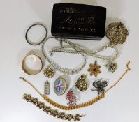 A 1951 Exhibition brooch, a silver ingot pendant &