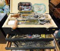 A carpenters tool box with contents