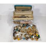 A quantity of bagged & boxed costume jewellery ite
