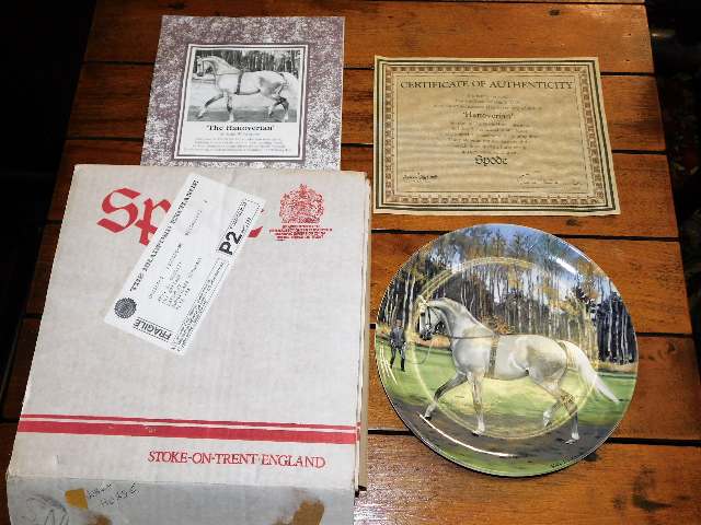 Seven boxed porcelain plates by Spode depicting th