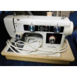 A New Home electric sewing machine