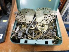 A small steel box of various cabinet related piece