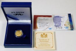 A 2013 cased Nelson Mandela 1/10th oz gold proof c