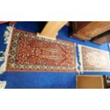 Two woollen rugs