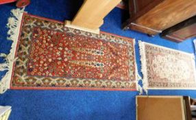 Two woollen rugs