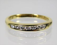 A 9ct gold ring set with approx. 0.25ct diamonds s