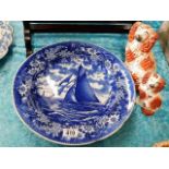 A Wedgwood charger depicting sailship & two Staffordshire dogs