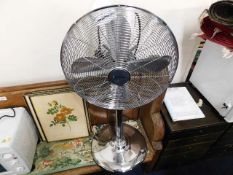 A modern Blaupunkt chrome electric fan, purchased