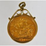 A 9ct gold mounted full gold sovereign 1909