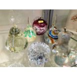 A cut glass crystal paperweight & five other paper