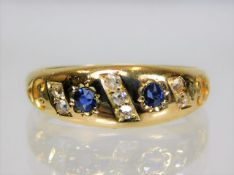 An antique 18ct gold ring set with sapphire & diam