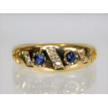 An antique 18ct gold ring set with sapphire & diam