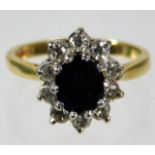 An 18ct gold sapphire & approx. 0.6ct diamond ring
