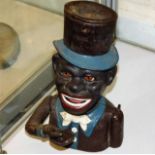 A 20thC. cast iron Americana money box