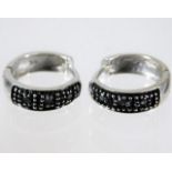 A pair of 9ct white gold earrings set with black d