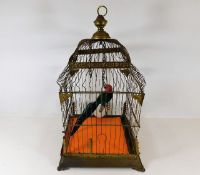 A brass decorative bird cage