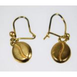 A pair of yellow metal coffee bean earrings 0.9g