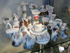 A collection of crested ware items