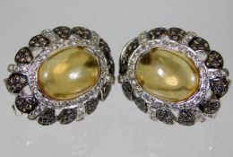 A pair of 18ct gold citrine earrings set with 2ct