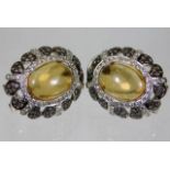 A pair of 18ct gold citrine earrings set with 2ct