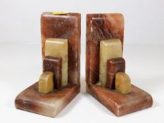 A pair of art deco onyx bookends