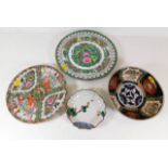 Four Oriental porcelain plates & dishes including