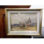 A small gilt framed watercolour of rural village s