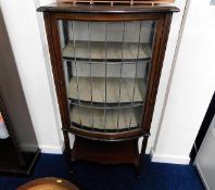 A glazed mahogany display cabinet