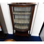 A glazed mahogany display cabinet