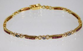 An 18ct gold bracelet set with diamond & ruby 7.4g