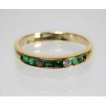 An 18ct gold emerald & diamond ring size L 2.1g