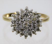 A 9ct gold diamond cluster ring size P/Q 2.8g