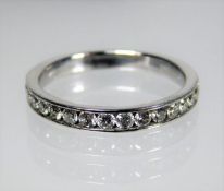 A 9ct gold half eternity ring set with approx. 0.6