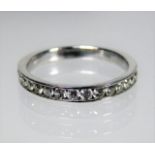 A 9ct gold half eternity ring set with approx. 0.6