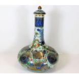 A 19thC. Chinese polychrome porcelain bottle vase