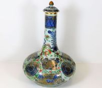 A 19thC. Chinese polychrome porcelain bottle vase