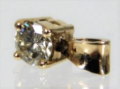 A 9ct gold pendant set with diamond 0.5g