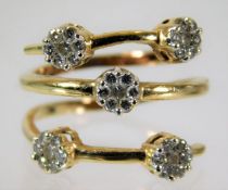 An unusual 14ct gold ring set with diamonds size J