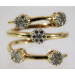 An unusual 14ct gold ring set with diamonds size J