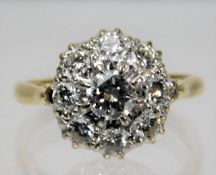 An 18ct gold diamond cluster ring approx. 1.3ct si