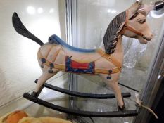 A vintage wooden model of rocking horse