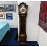 A brass & silver coloured dial longcase clock with