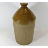 A stoneware wine spirit bottle H. Willford & Co. C