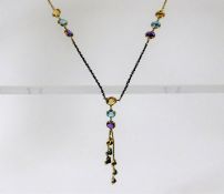 A 14ct gold necklace set with amethyst, citrine &
